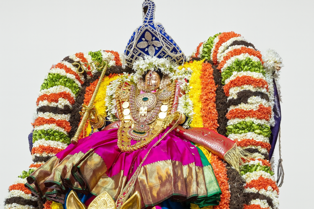 20251214_1844_Vibrant Festival Statue_remix_01kcefw1rreep916fy608hn7mw Tirupati car rental package from Chennai by car